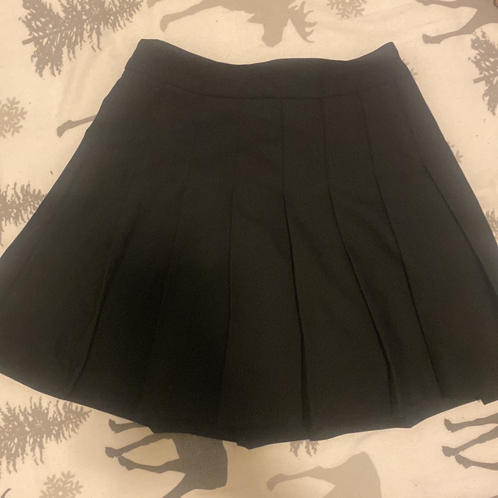 Black pleaded skirt from Artizia